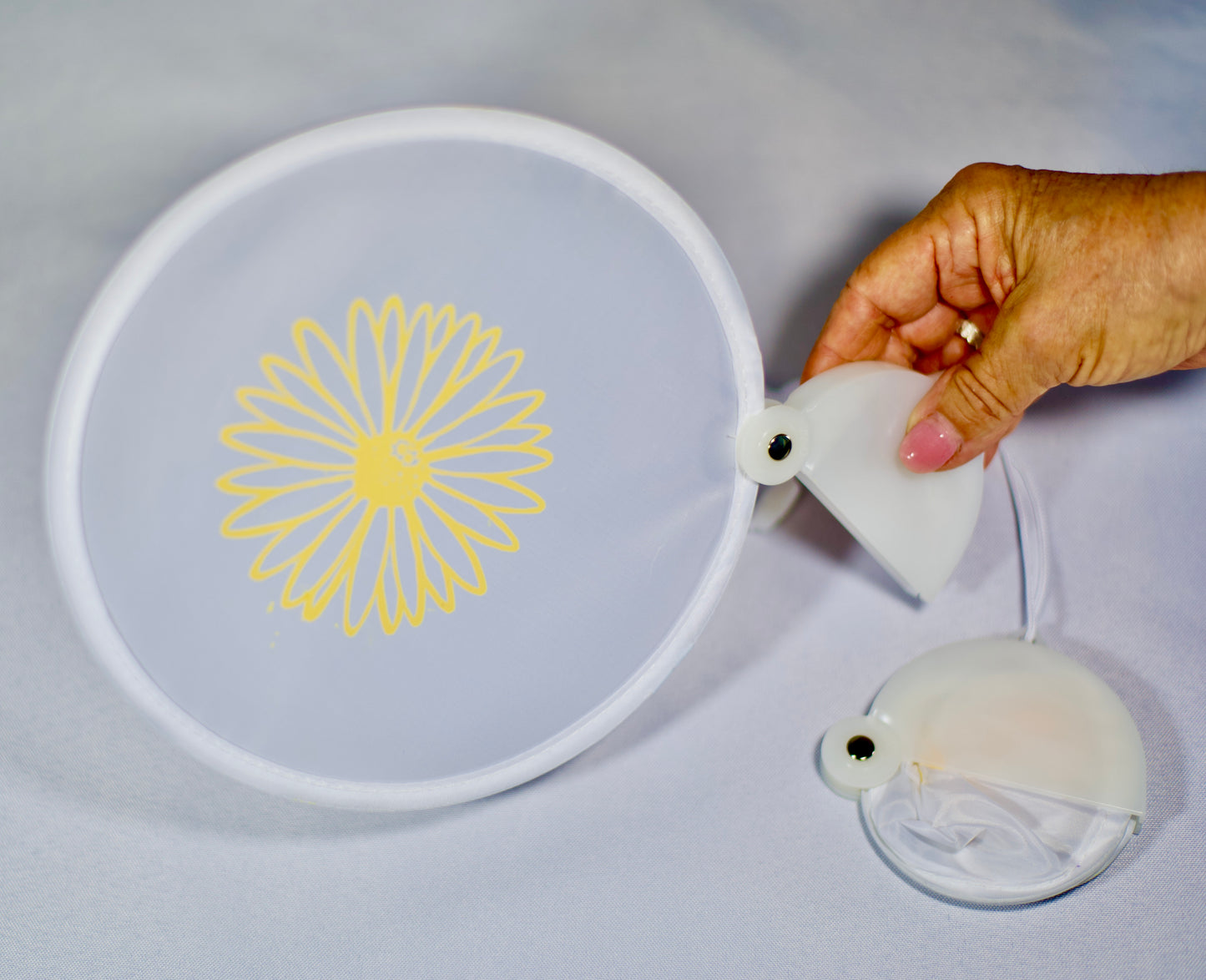 White Hand Folding Fan with P.E.O. Daisy