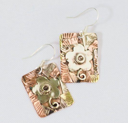 Handmade Copper, Silver and Brass Earrings with a  Single Daisy